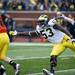 Defensive end Mario Ojemudia reaches out to tackle during the Michigan spring football game on Saturday, April 13. AnnArbor.com I Daniel Brenner